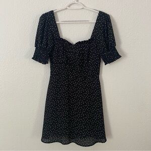 Rixxi black and white ruched polka dot mini cocktail dress size S short sleeve